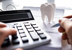 Bergenfield patient reviewing Smile Savings Club and CareCredit options