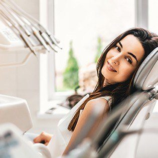 lady laying in exam room