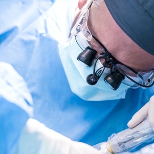 A dental professional performing a procedure on a patient