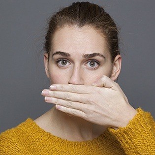 woman with halitosis