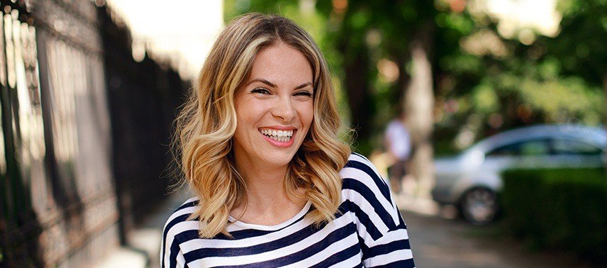 woman in black and white striped shirt