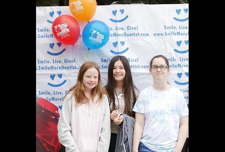 three patients smiling