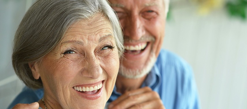 An older couple smiling