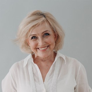 Woman smiling with dentures