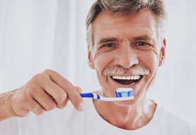 Man brushing his teeth