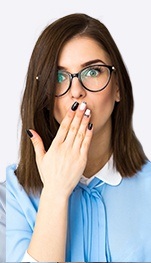 woman covering mouth with black and white nails