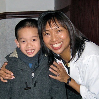 mother and son smiling