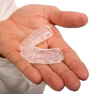 mouthguard in hand