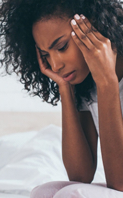 A woman with a headache