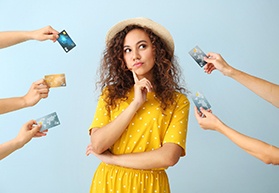 Woman surrounded by credit cards