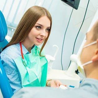 Woman learning about sedation dentistry in Bergenfield
