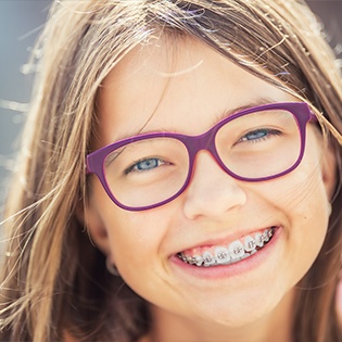 young girl with braces