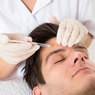 man getting botox