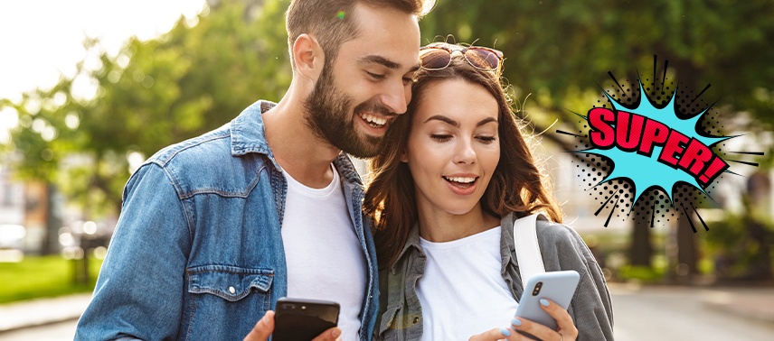 couple smiling while researching the Referral Program in Bergenfield